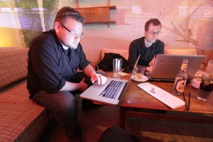 Two beta users reviewing stock performer